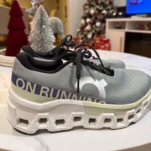 On Running Gray and Black Sneakers